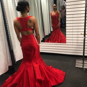 A red Jovani Formal Gown